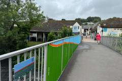 Erme on the footbridge to the shopping centre
